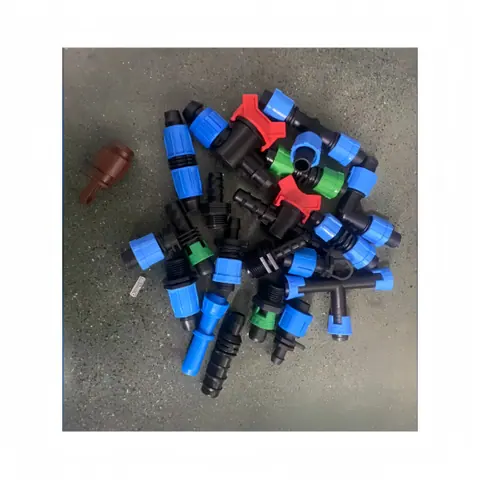 Small PVC fitting sample photographed after molding